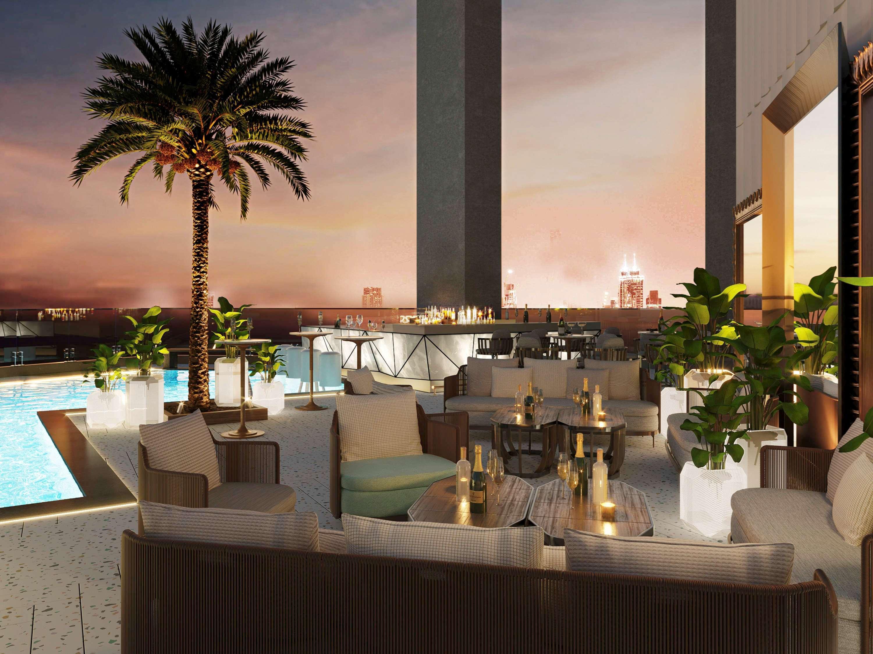 Sls Dubai Hotel & Residences Exterior foto The rooftop pool at the Ritz-Carlton, DIFC